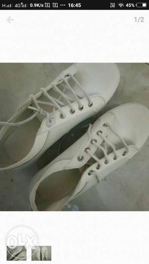 Branded white shoes
