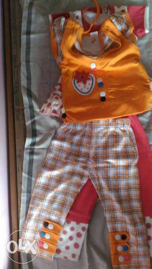 Girl's Orange Cap-sleeved Shirt And Pants