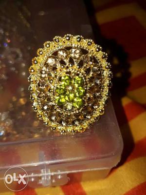 Gold-colored Green Gemstone Ring