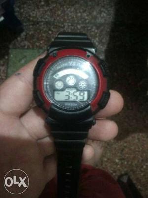 Good condition watch with 7 colour lights red and