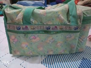 Green And Multicolored Diaper Bag monkey bag for Kis.andbed