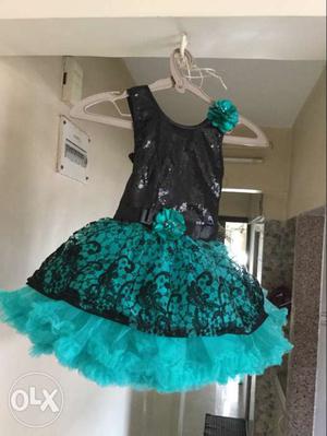Green n Black frill frock for 4 years old almost