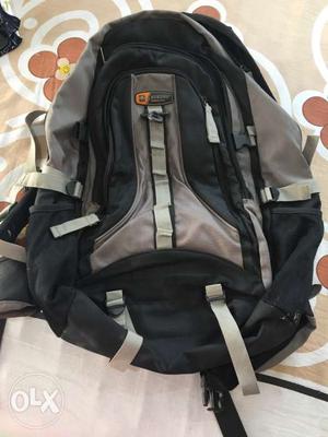Grey n black color back pack.Size is inches