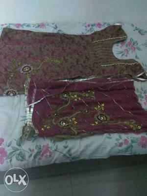 Heavy embroidery suit. And heavy work dupatta.