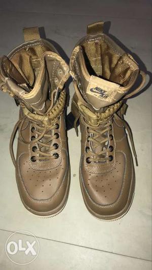 Pair Of Brown Nike Air Shoes