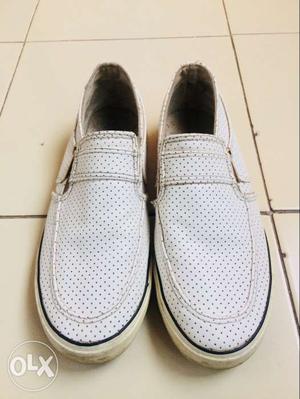 Pair Of White Leather Slip On Sneakers