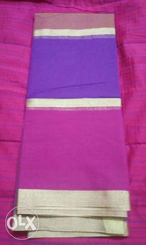 Pink, Beige, And Purple Textile