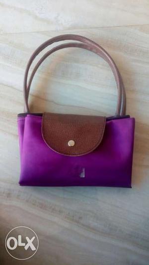 Purple And Brown Leather Handbag