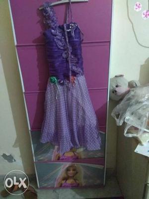 Purple coloured Long Gown for baby girl of age