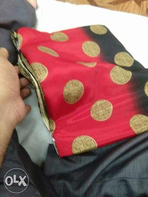 Red And Beige Polka Dotted Textile