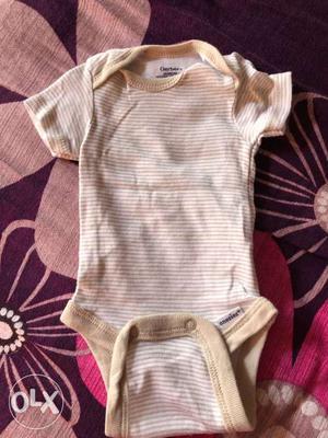 Set of 4 onesies.. worn only ones..for new borns