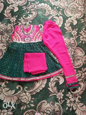 Size 22.yrs 3-4.red n green colour dress for baby