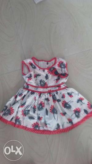 Toddler Girl's two Red And White Floral Dresses