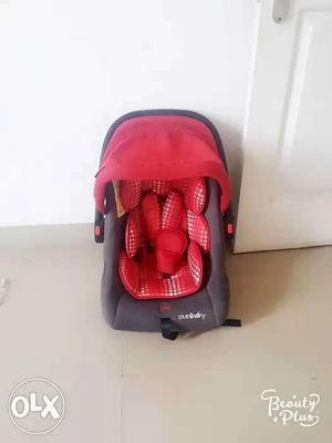 Toddler's Red And Black Carrier Seat