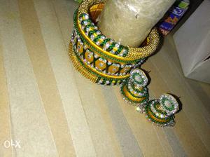 Yellow and green colour thread bangles