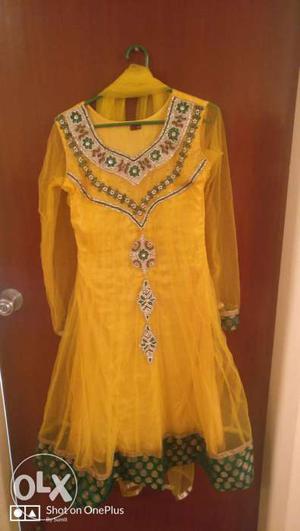 Yellow colour stone work ethnic salwar suit