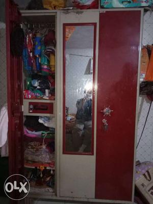 3 Door metal cupboard with mirror only 3 years