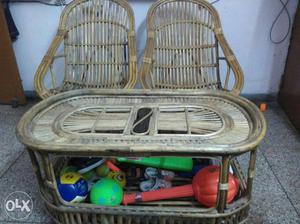 4 cane chairs and a centre table in excellent condition