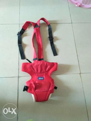 Baby's red And black Chicco Carrier