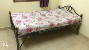Black Steel Bed along with mattress