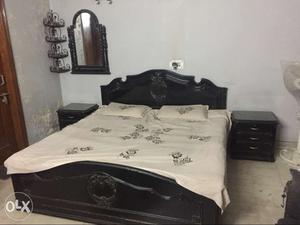 Black deco bed with both side tables and mirror