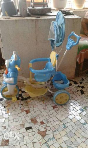 Blue And Yellow Tricycle Stroller