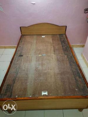 Brown Wooden Bed in excellent condition with storage system