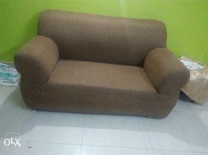 Brown two seater sofa.Three months old,good in condition