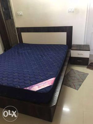 Double size bed with storage unit