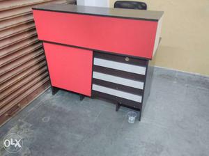 Red, White, And Black Wooden Desk