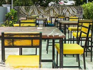 Restaurant Tables and chairs with cushions for