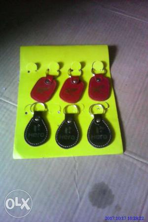 Three Black And Three Red Leather Keychains Package