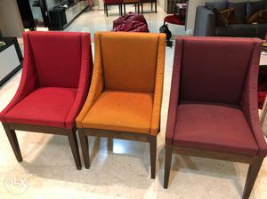 Three Padded Brown Wooden Framed Chairs