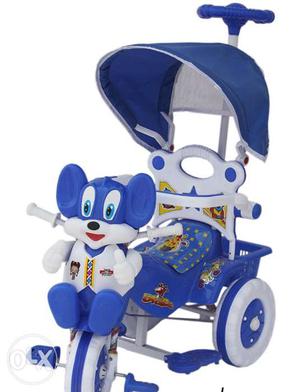 Toddler's Blue And White Ride-on Trike with shade