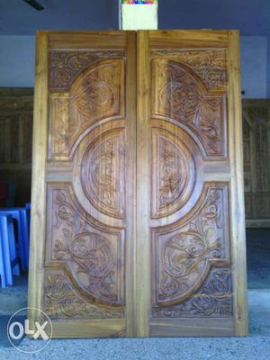Two Brown Wooden Floral Embossed Doors