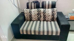 White,black,and,brown Loveseat