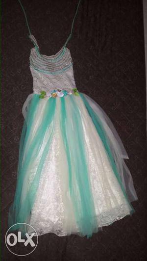 White n green colour gown for children years 5-8