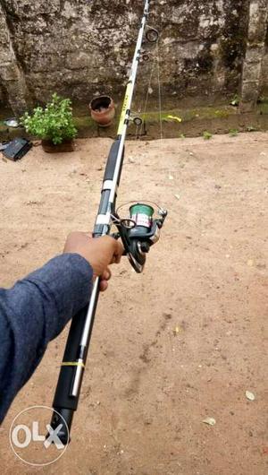 Fishing rod with reels and tread