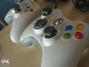 Two White Xbox 360 Game Pads