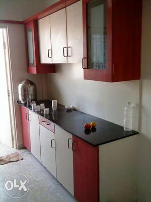Beige And Red Wooden Kitchen Cabinet