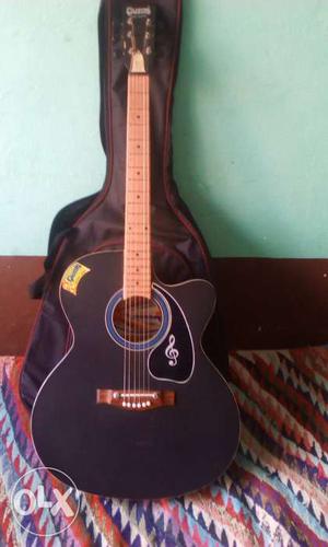 Black Acoustic Guitar With Bag