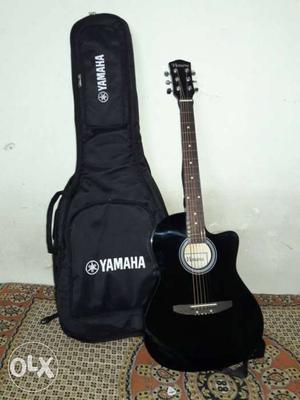 Black Yamaha Cutaway Acoustic Guitar With Box