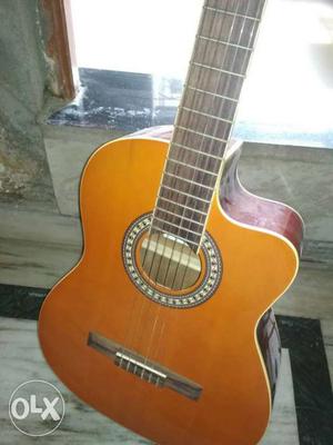 Brown And Orange Single-cutaway Acoustic Guitar