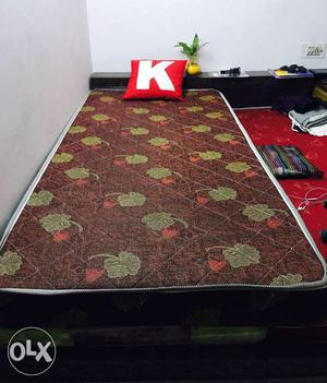 Brown, Green, And Red Floral Mattress