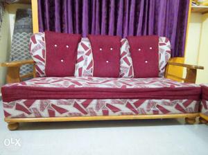 Brown Wooden Framed White And Red Fabric Padded Sofa