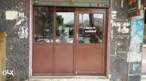 Brown Wooden Sliding Doors Store Front