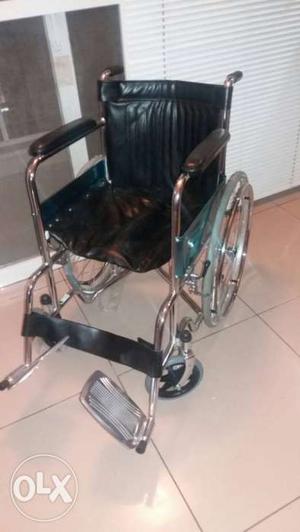 Folding wheel chair for patients with fracture. Hardly used