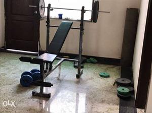 Gym bench rod along with 75 kg weights