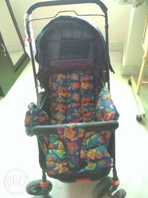 Stroller for baby Blue in colour Can be folded,