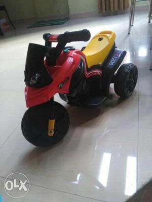 Toddler's Red And Yellow Power Wheel